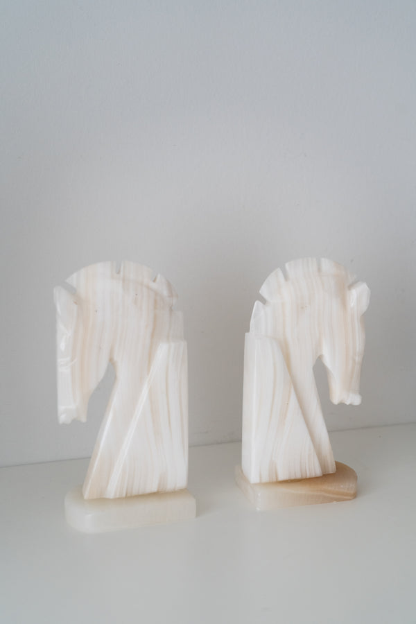 Pair of marble bookends shaped like a horse head